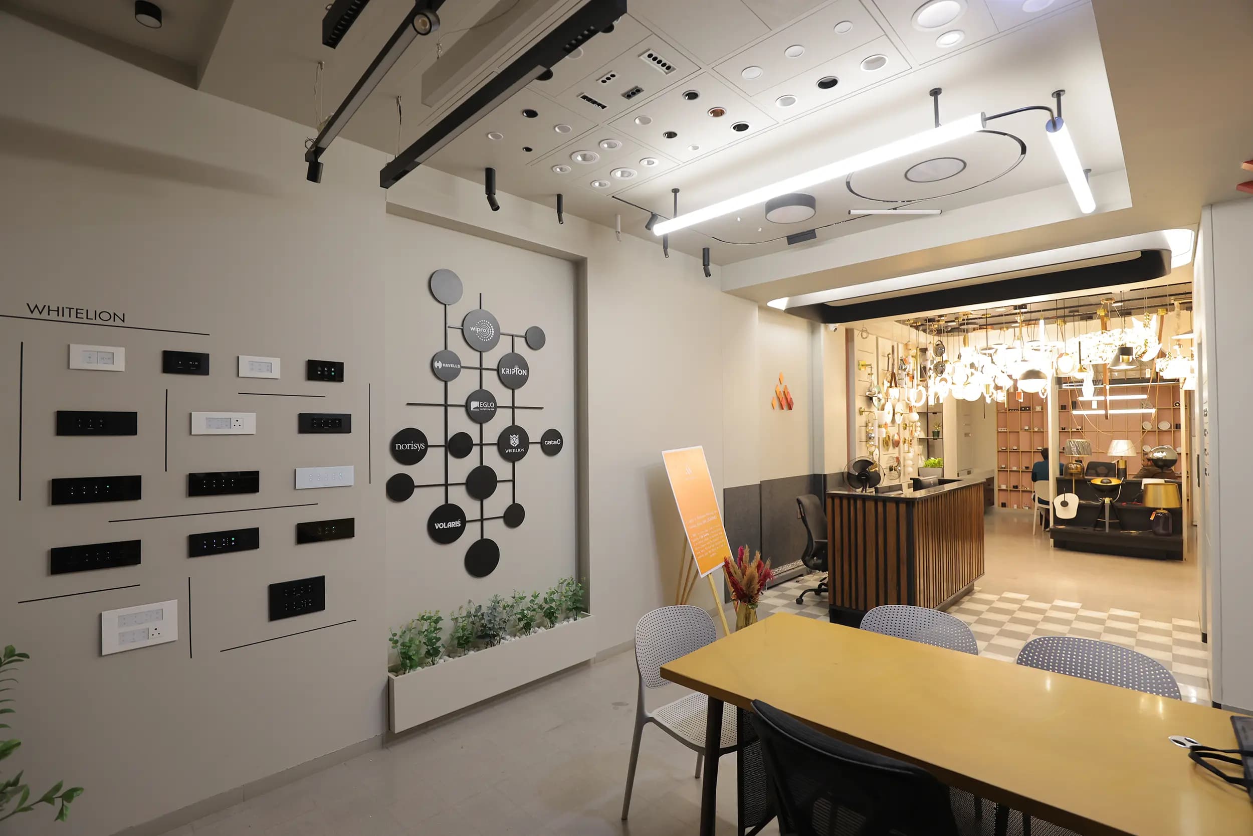 Inside the AMI Lighting studio — switch display wall and decorative lighting hall